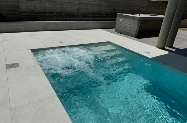 Modern swimming pool with bubbling water